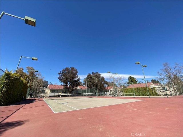 view of tennis court with basketball court