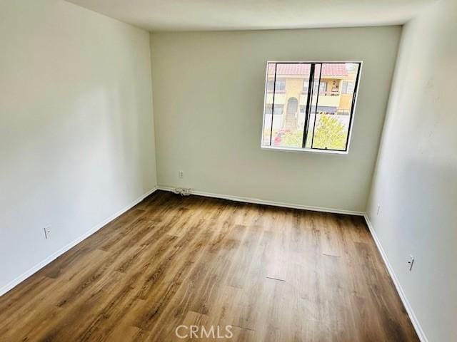 unfurnished room featuring light wood-type flooring