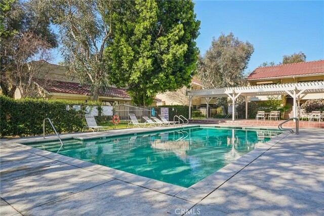 18808 Mandan St Unit 312, Canyon Country, CA 91351 - pool with a pergola, a patio, and fence