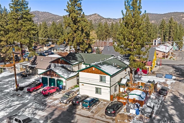 drone / aerial view featuring a mountain view