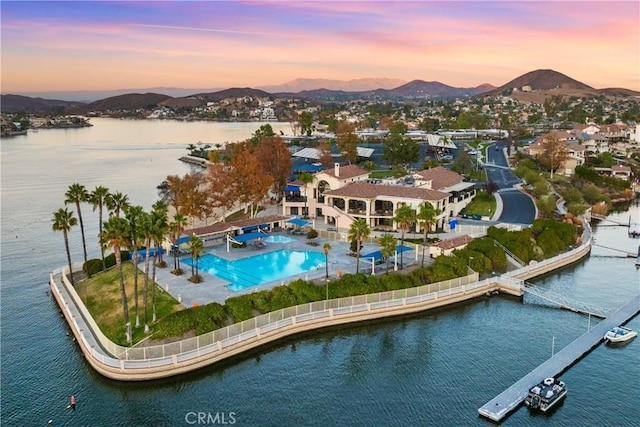 bird's eye view featuring a water and mountain view