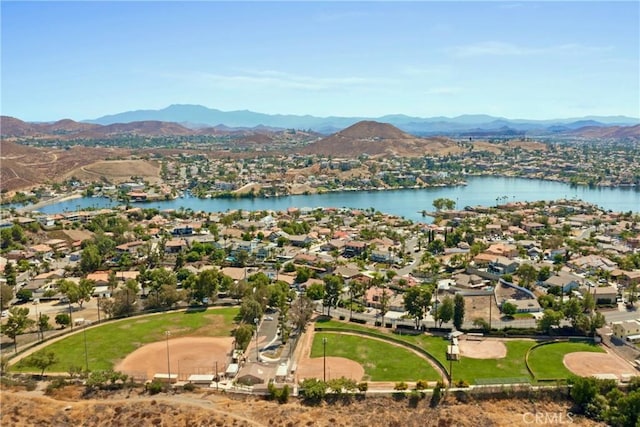 bird's eye view featuring a residential view and a water and mountain view