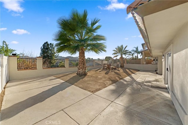 view of patio / terrace featuring outdoor dining area and fence