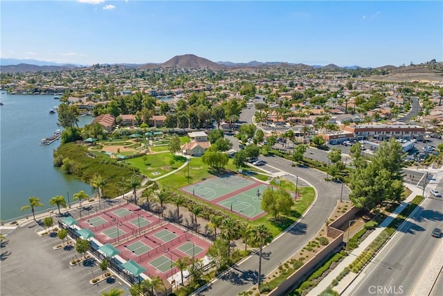 aerial view featuring a water and mountain view