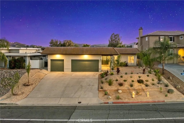 view of front of house with a garage