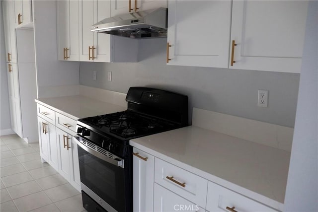 kitchen with light tile patterned floors, white cabinets, and black gas range