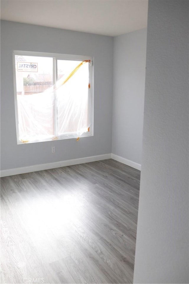 empty room featuring hardwood / wood-style floors