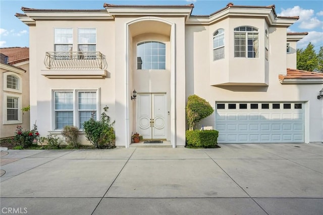 view of front of property with a garage