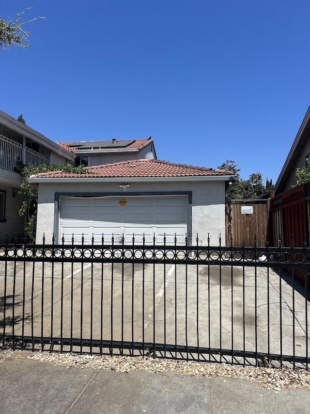 garage featuring solar panels