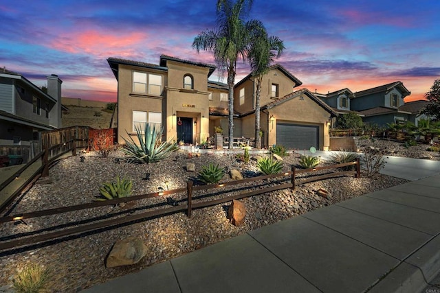 view of front of home with a garage