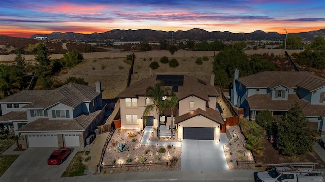 aerial view at dusk with a mountain view