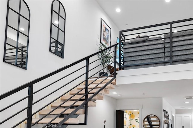 stairs with a towering ceiling