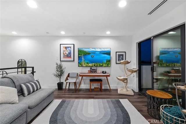 living room with dark hardwood / wood-style flooring