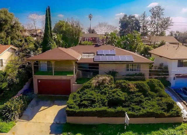 view of front of home with solar panels