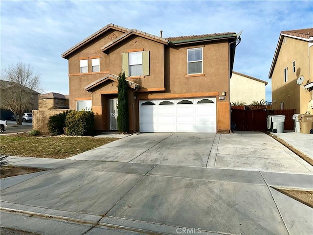 front of property with a garage