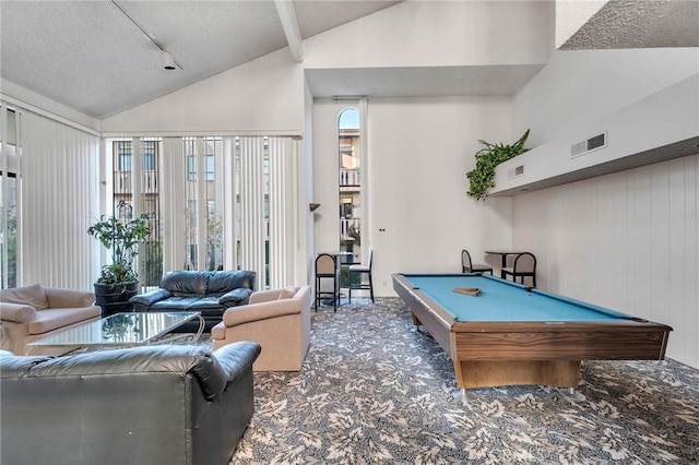 game room featuring dark colored carpet, rail lighting, pool table, and vaulted ceiling