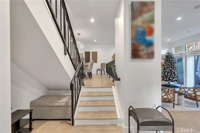 stairway featuring hardwood / wood-style floors