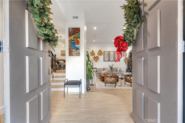 foyer entrance featuring light hardwood / wood-style flooring