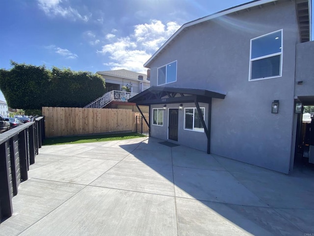 back of house featuring a patio