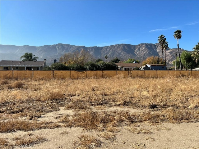 view of mountain feature with a rural view