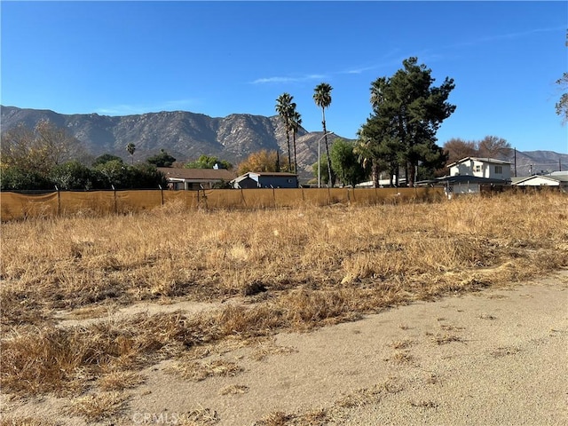 view of mountain feature featuring a rural view