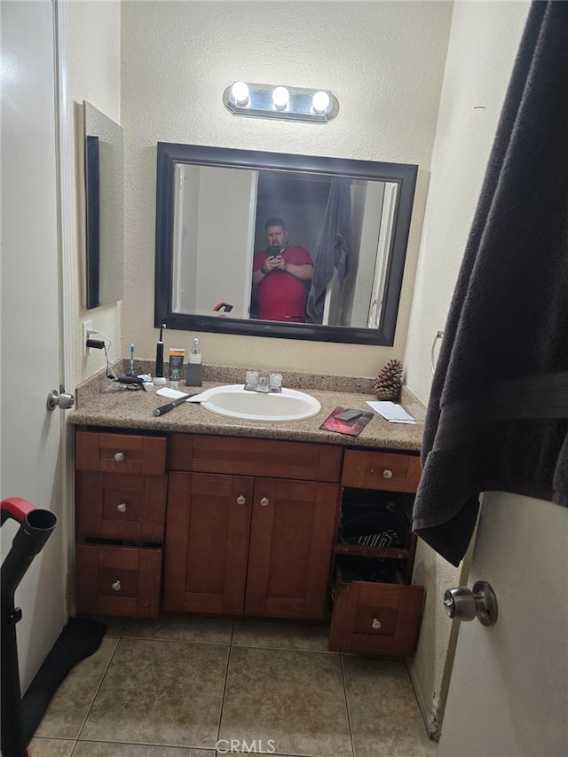 bathroom featuring vanity and tile patterned floors