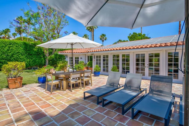 view of patio featuring french doors