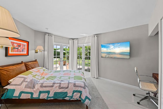 bedroom with light tile patterned floors, access to exterior, and french doors