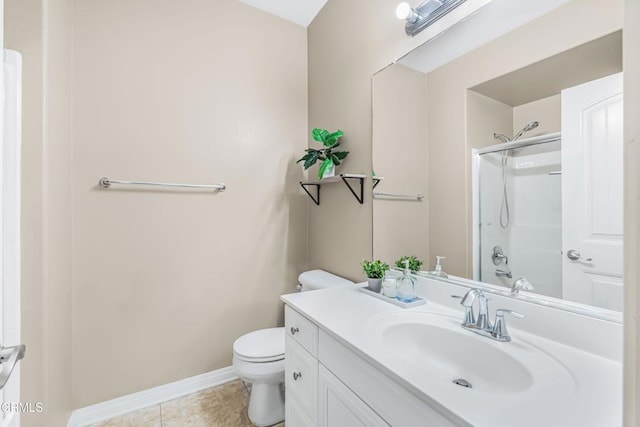 bathroom with tile patterned floors, toilet, vanity, and a shower