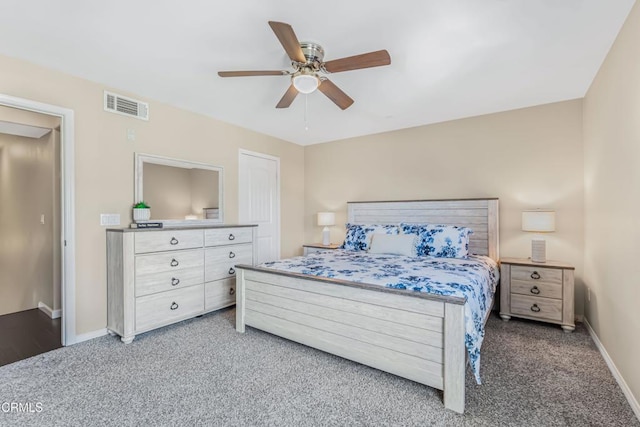 carpeted bedroom with ceiling fan