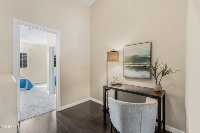 office with dark hardwood / wood-style floors