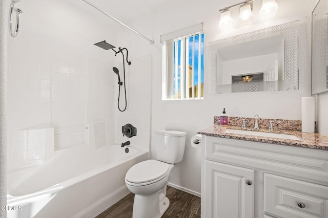 full bathroom with shower / bathtub combination, hardwood / wood-style flooring, toilet, and vanity