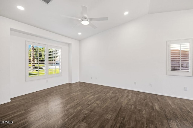 unfurnished room featuring lofted ceiling, ceiling fan, and dark wood-type flooring