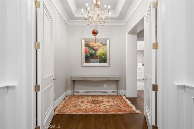 interior space with an inviting chandelier and dark hardwood / wood-style floors