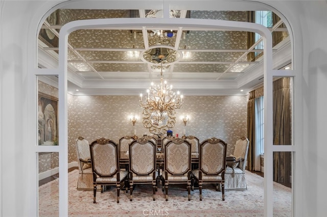 dining room featuring crown molding, a chandelier, and coffered ceiling