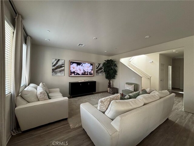 living room with dark wood-type flooring