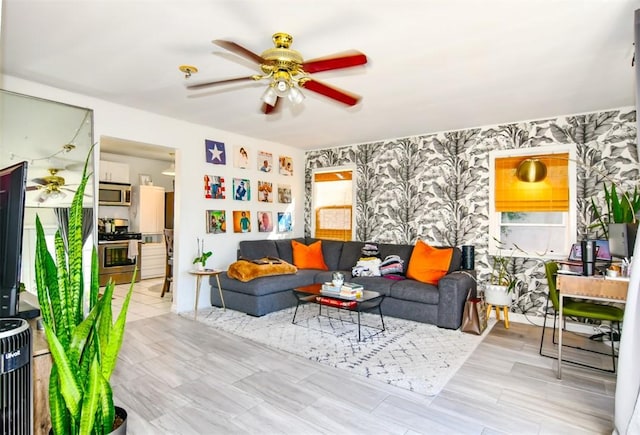 living room with ceiling fan