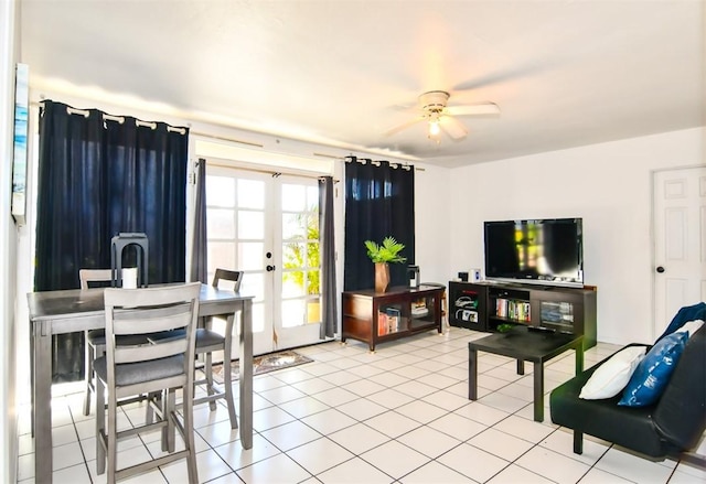 living room with ceiling fan, french doors, and light tile patterned flooring