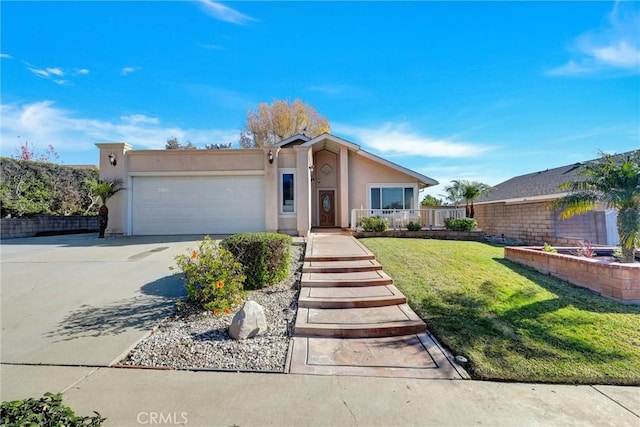 ranch-style house featuring a front yard and a garage