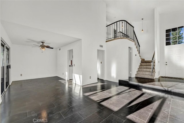 foyer with ceiling fan