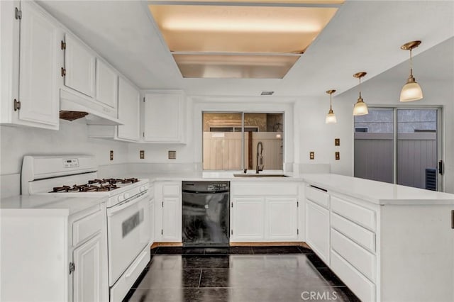 kitchen featuring white range with gas stovetop, kitchen peninsula, black dishwasher, hanging light fixtures, and white cabinets