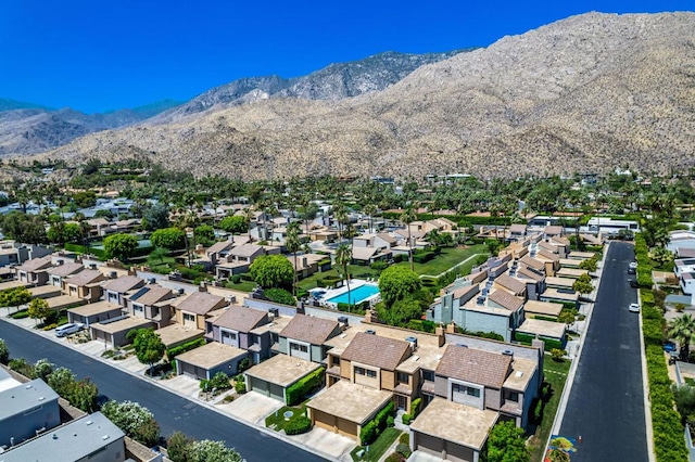 drone / aerial view featuring a mountain view