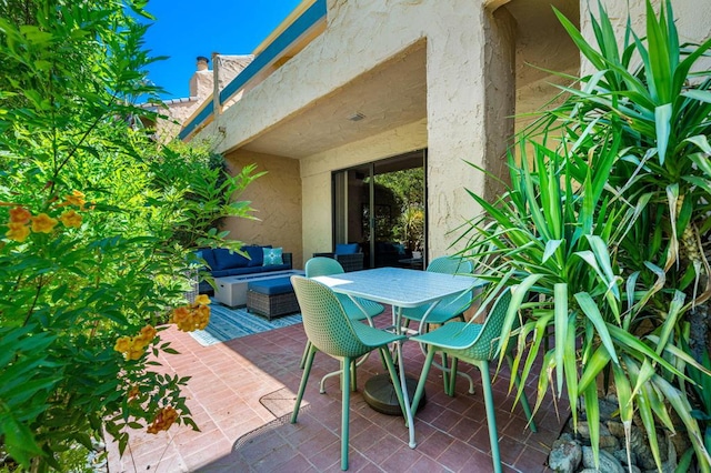 view of patio with an outdoor living space