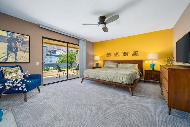 bedroom featuring ceiling fan, light colored carpet, and access to outside