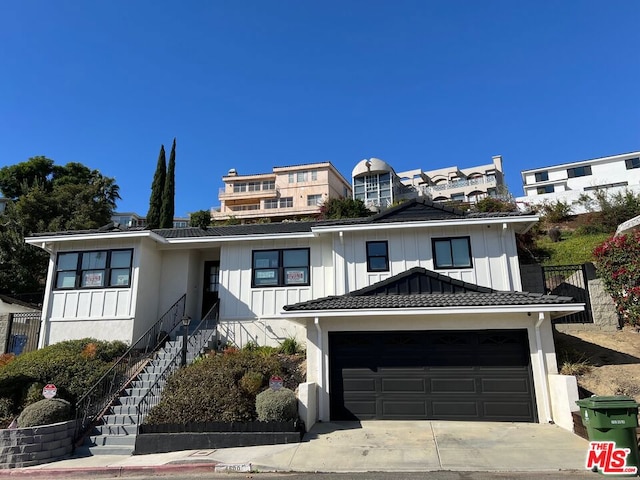 view of front of property with a garage