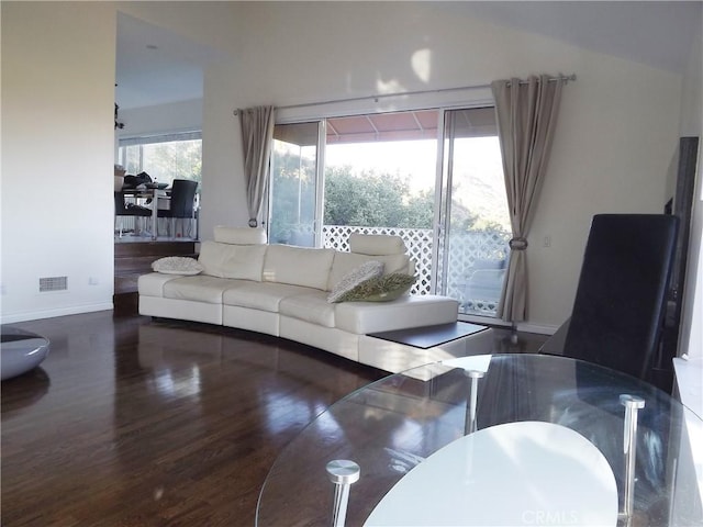 living room with hardwood / wood-style flooring and plenty of natural light