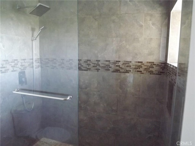 bathroom featuring walk in shower