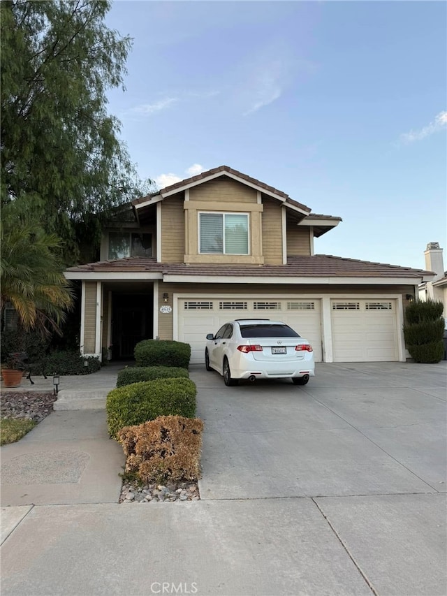 view of front of property with a garage