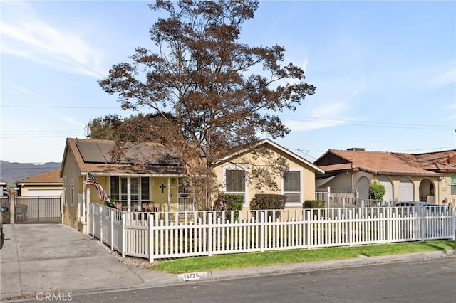 single story home with solar panels