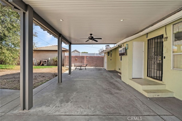 view of patio featuring ceiling fan